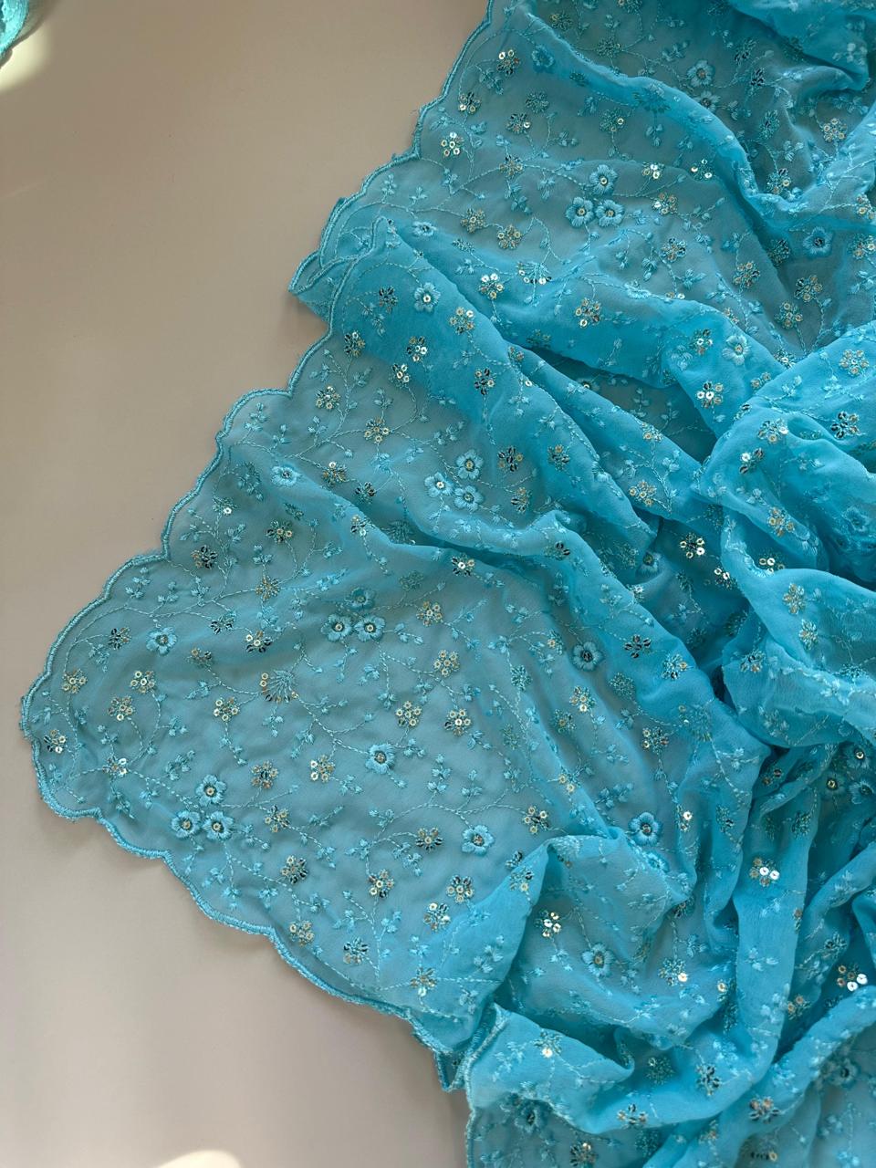 Sky Bloom Embroidered Georgette Saree