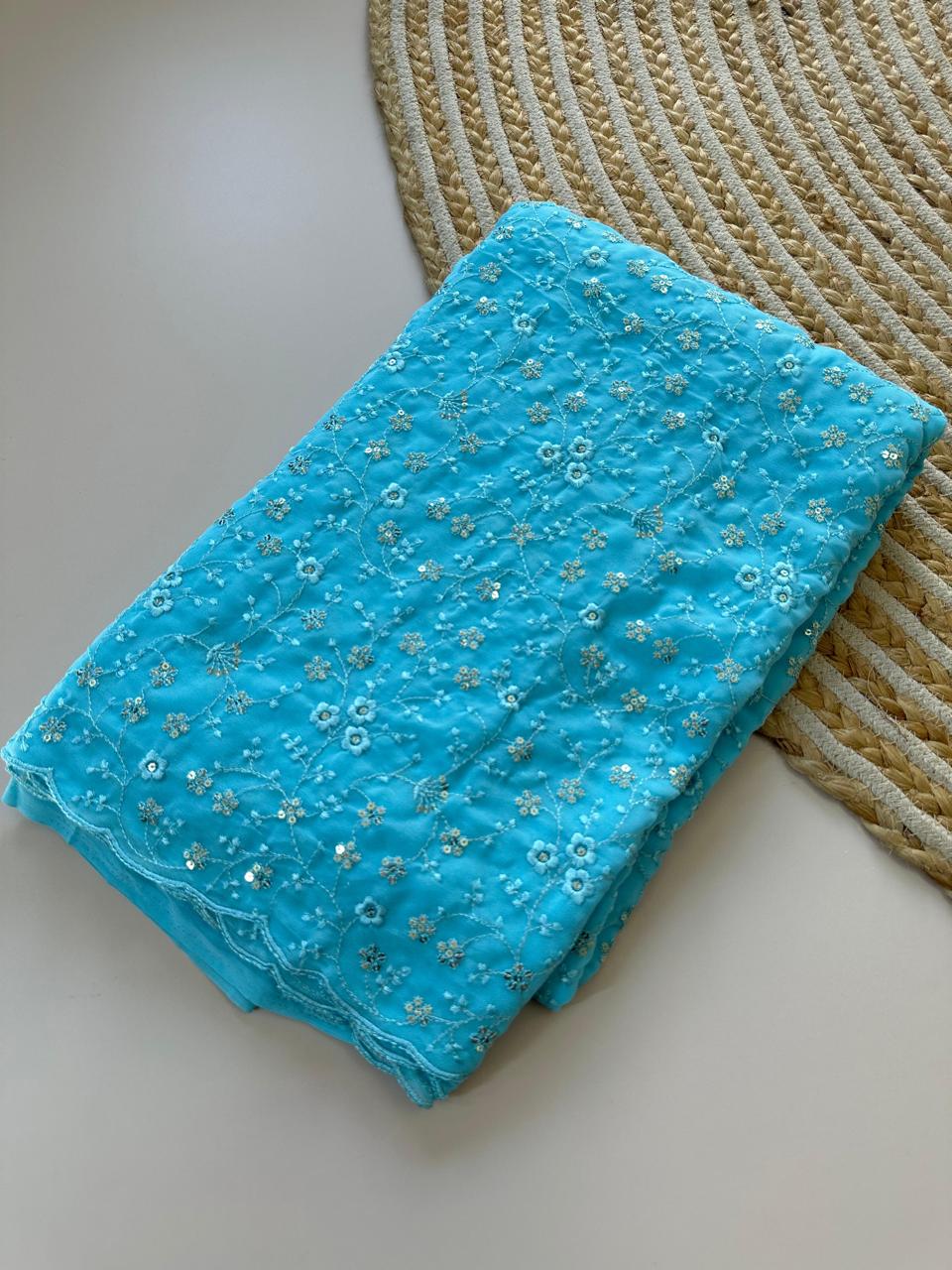 Sky Bloom Embroidered Georgette Saree